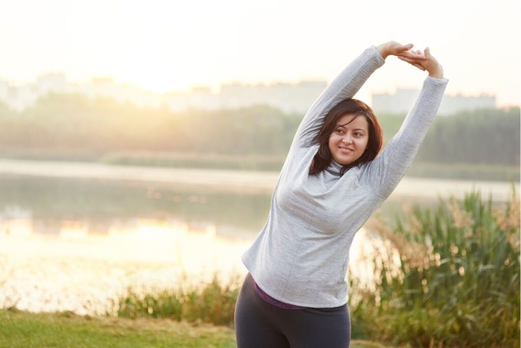 Lady stretching showing movement for everyday health